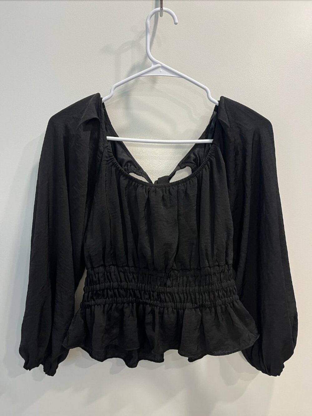 Long-sleeved Black Peplum Top
